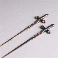 Set of twelve 1920s silver novelty cocktail sticks, modelled as swords, hallmarked Mappin and Webb, Sheffield 1929, contained within tooled leather case