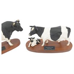 Two Beswick Connoisseur Cattle: Friesian Bull, model and Friesian Cow and Calf, both on wooden plinths, H20cm