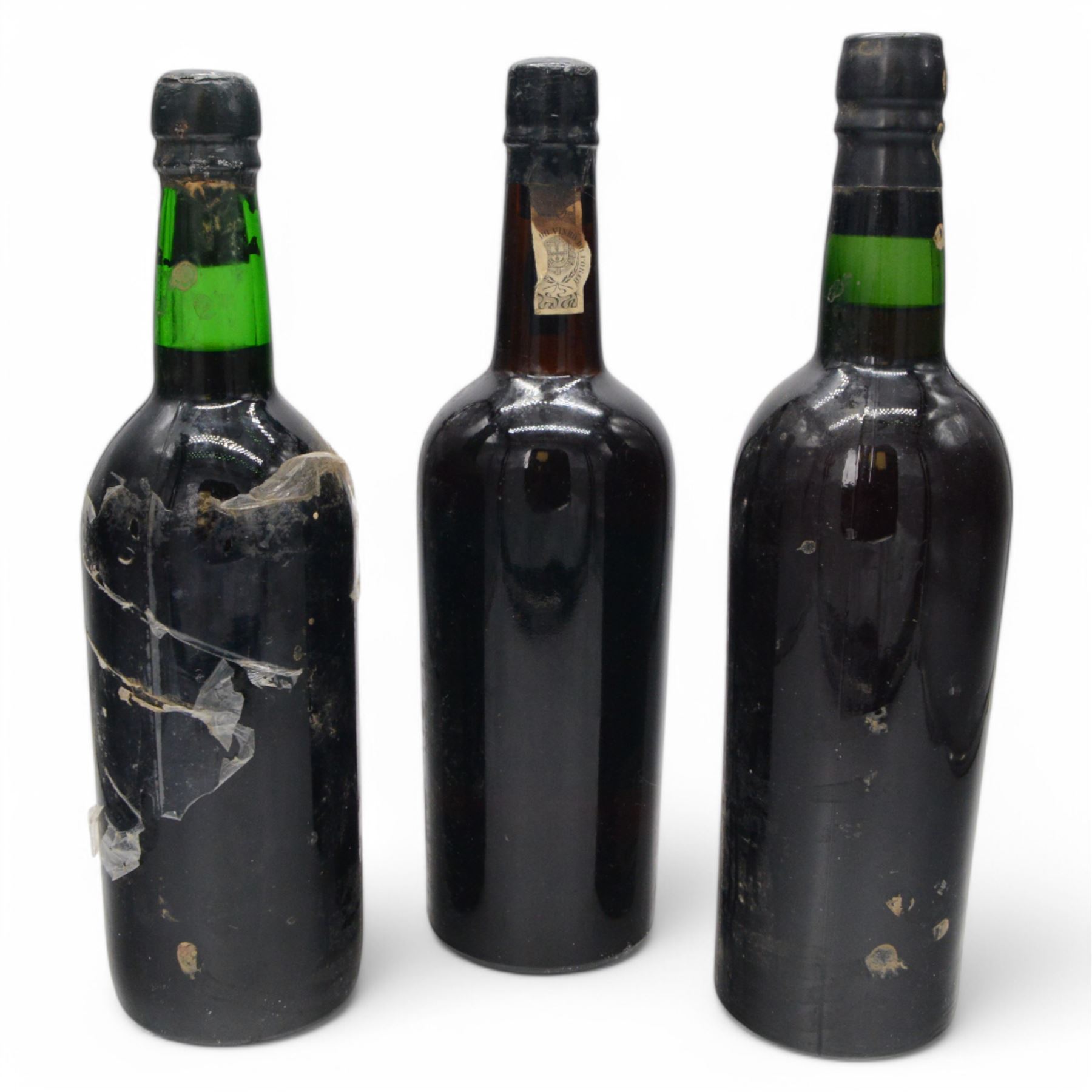 Mix vintage port, comprising Dow's 1962, Cockburn's 1963 and Taylors 1970, various content and proof 