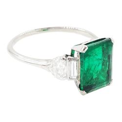 Platinum Colombian emerald and diamond ring, single emerald cut emerald of approx 3.00 carat, each side set with a single baguette cut and heptagonal cut diamond, with The Gem & Pearl Laboratory report