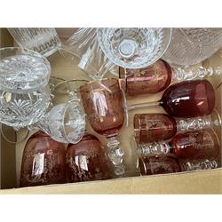 Mid century iridescent glass vase with swagged decoration marked Sanders & Wallace, cranberry glass, decanters, wine glasses etc, in three boxes  