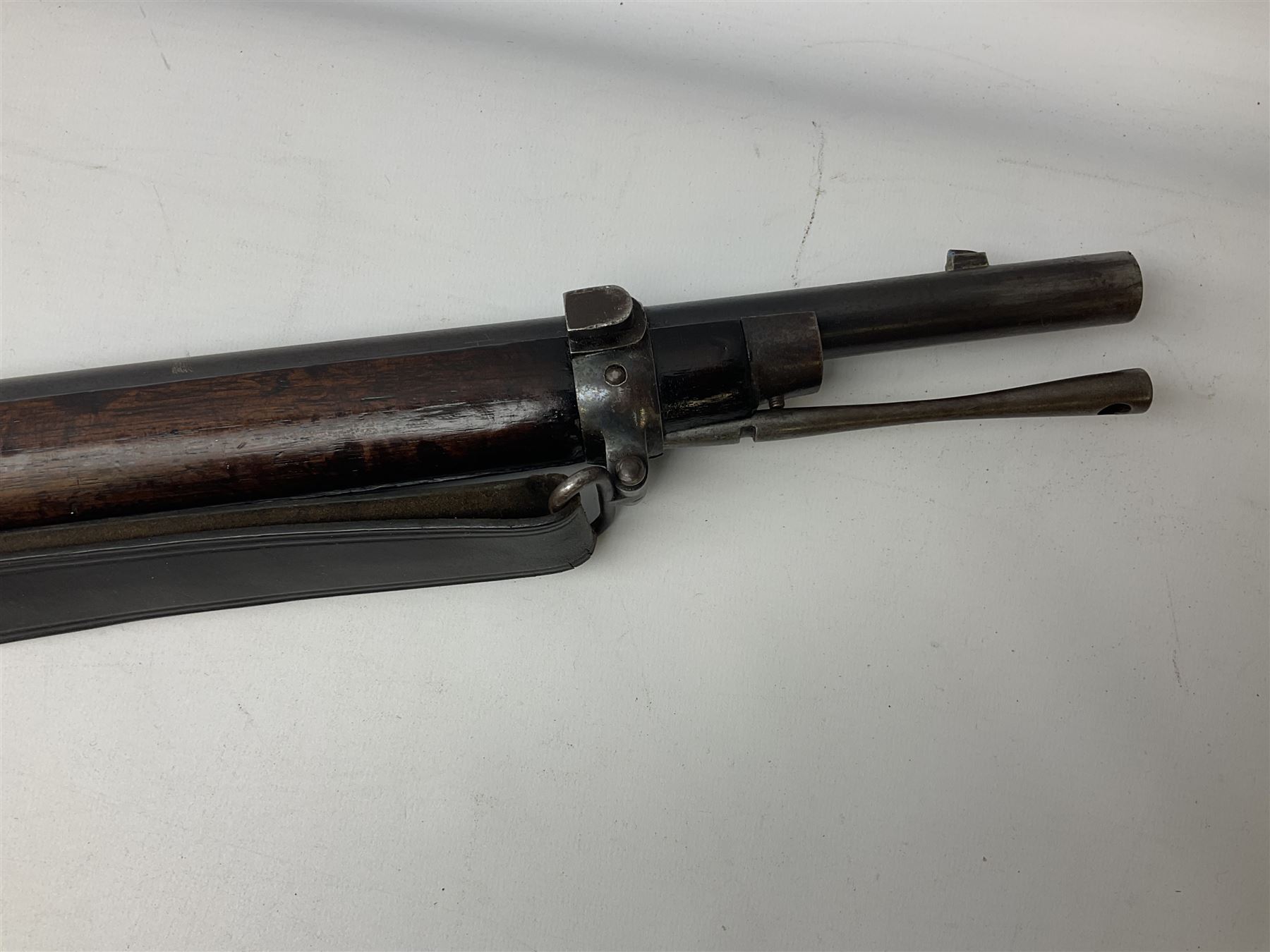Braendlin Armoury Martini action .577/450 falling back rifle, the 85cm rifled barrel stamped Alex. Henry Edinburgh & London with two barrel bands including Yatagan bayonet side fitting and clearing rod under, with leather sling, serial no.13332, L126cm (NB. Firing pin broken). 