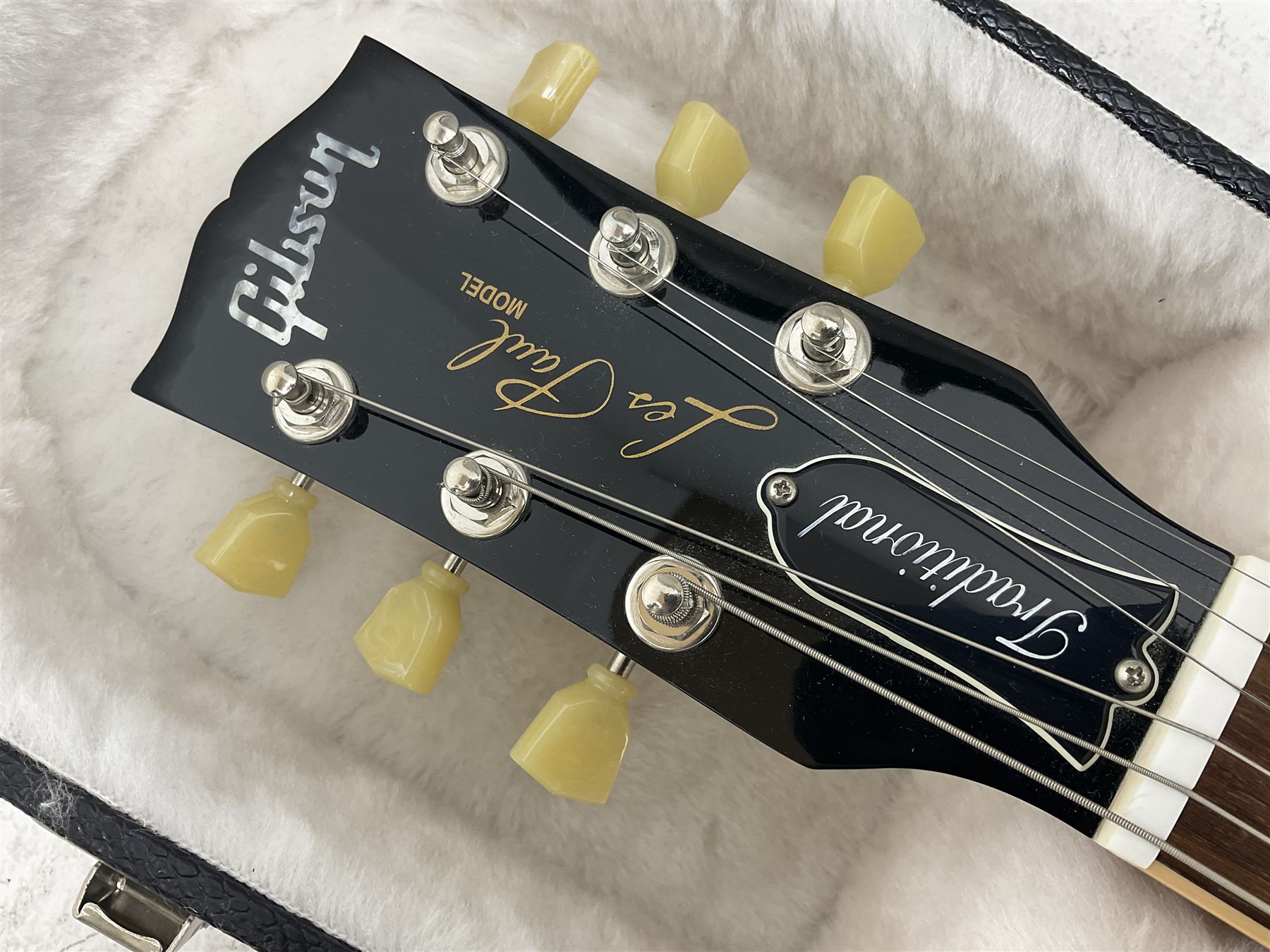 2011 Gibson Les Paul Traditional gold top electric guitar; serial number 103110461; with  mahogany back, twenty-two frets, 57 Classic humbuckers and bridge/stop bar tailpiece L100cm; in Gibson hardcase with owners manual and associated paperwork