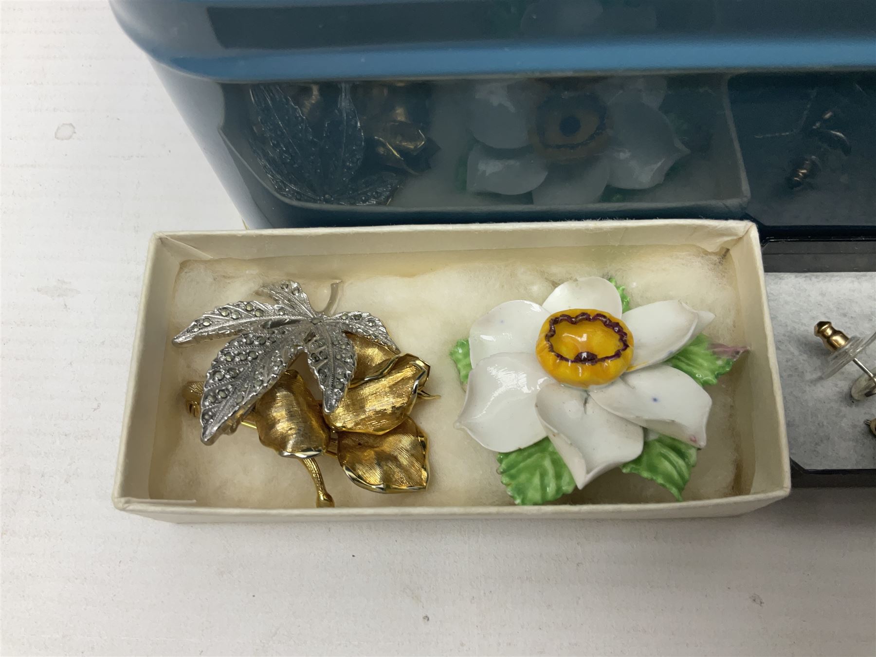 Silver ammonite pendant, silver earrings and a collection of beaded and other costume jewellery