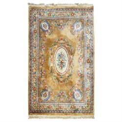Chinese Aubusson/Savonnerie style hand-knotted carpet, ivory field with a central oval med...