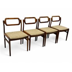 Johannes Andersen for Uldum Mobelfabrik - set of eight Danish teak dining chairs, each with open back rests with curved edges, upholstered seats in a neutral woven fabric, raised on tapered supports