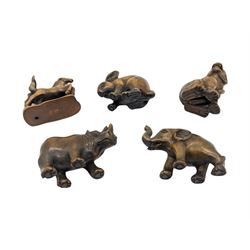 Five netsuke, modelled as two horses, rabbit, elephant, rhino and tiger