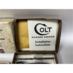 Six pairs of revolver grips;  pair of Lightwood & Son Ltd powder/shot measures in original box; and boxed Colt hammer shroud 