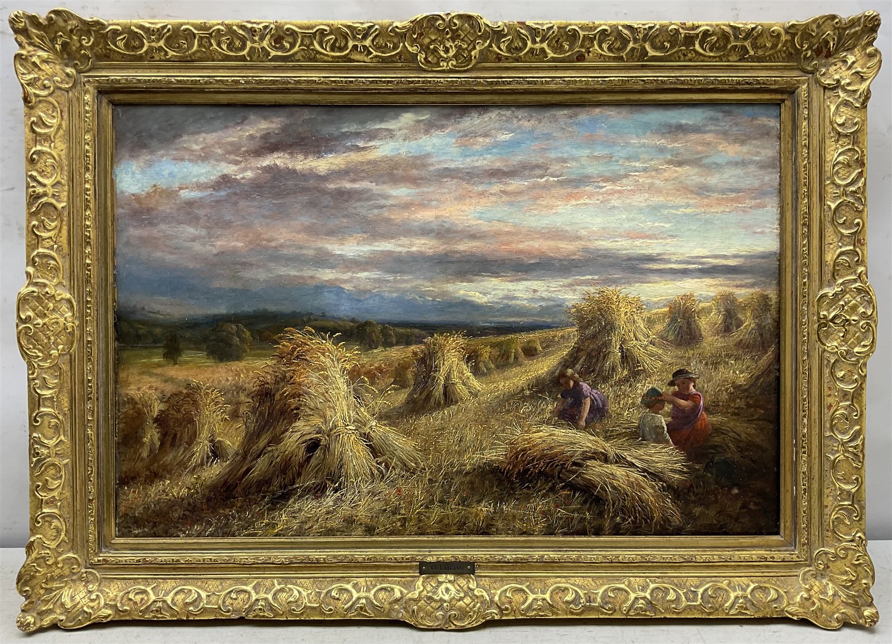 George Lucas (British fl.1863-1899): Children Playing among Corn Stooks, oil on canvas signed and dated 1867, 39cm x 60cm