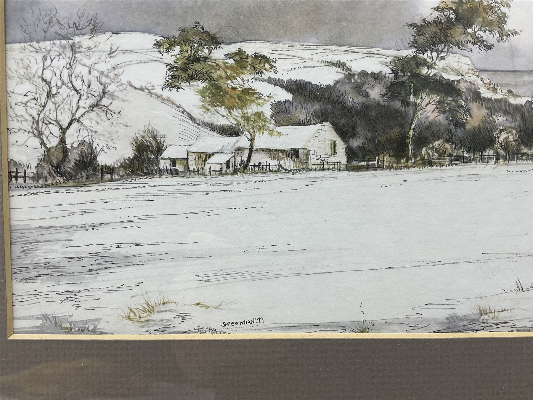 John Freeman (British 1942-): Snowy Landscapes, pair watercolours signed and dated ‘77, 17cm x 34cm (2)