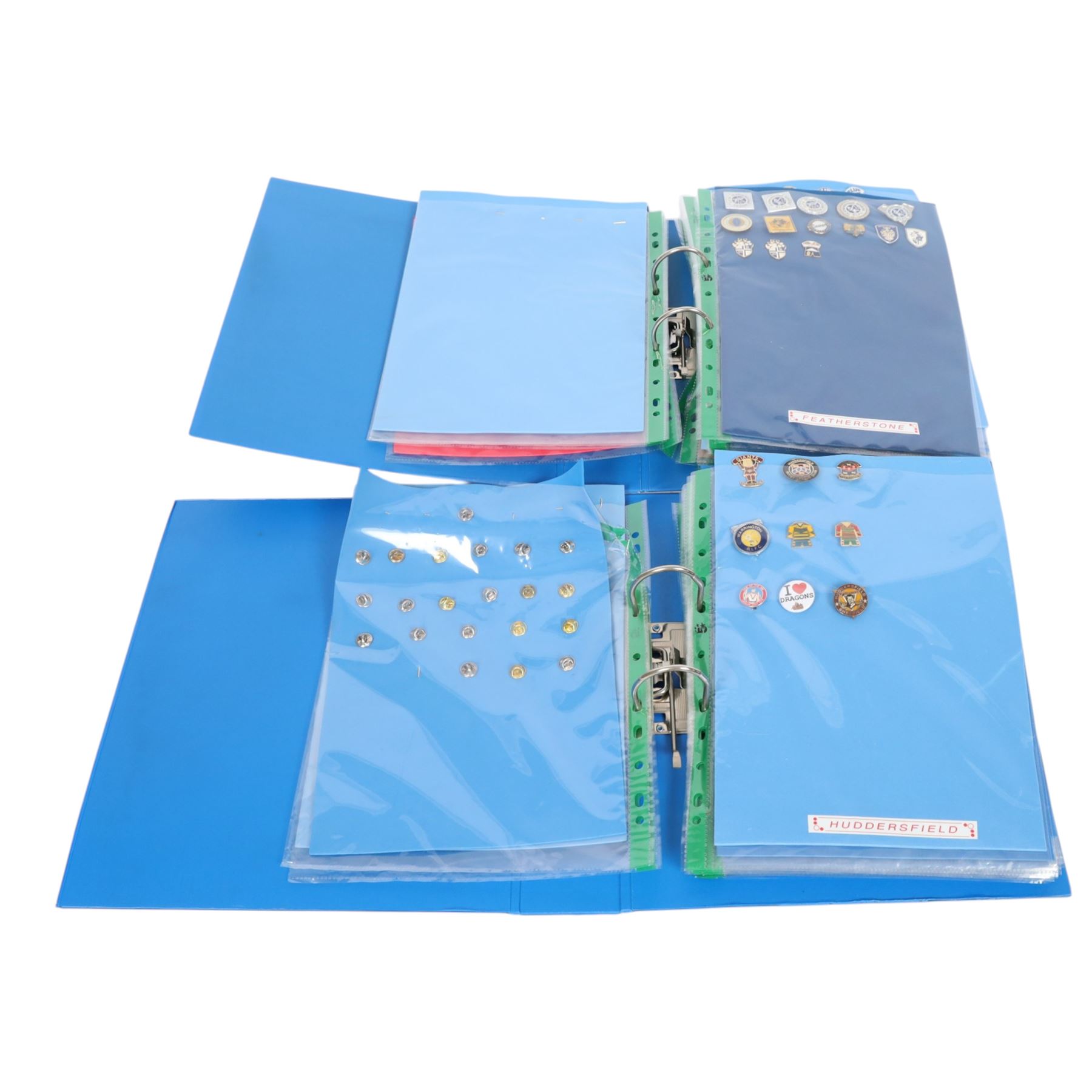 Rugby League club enamel badge collection, from teams including Bradford, Castleford, Huddersfield, Hull FC, Leeds, Leigh, St Helens, Salford, Wakefield, Wigan, York, Batley, Barrow, Bramely, Dewsbury, Featherstone, Halifax, Hunslet, Keighley, Oldham, Rochdale, Sheffield, Widnes, Workington, etc, all circa 2021, housed in two folders, (approximately 250)