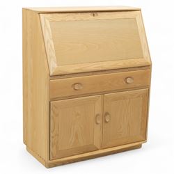 Ercol - light elm bureau, fitted with fall-front writing surface revealing adjustable shel...
