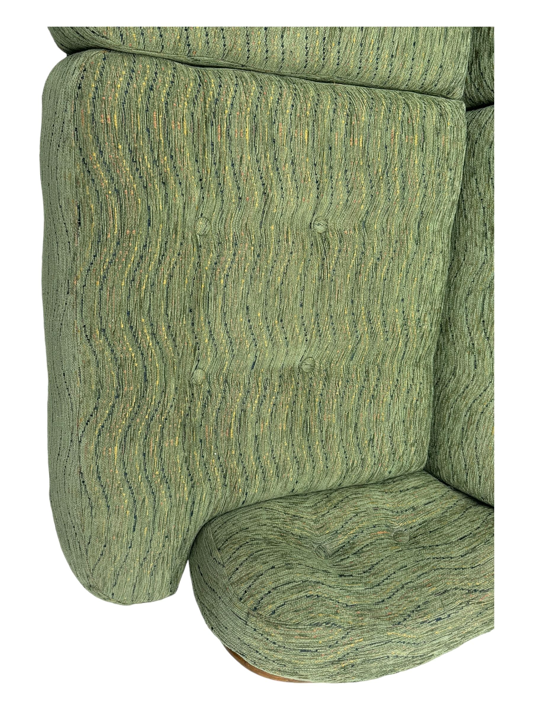 Ercol - mid-20th century three-piece suite, comprising two-seater sofa, upholstered in green fabric with teak frame, on splayed supports with stretcher (W142cm, D95cm, H87cm); with matching pair of armchairs (W82cm, D95cm, H87cm)
