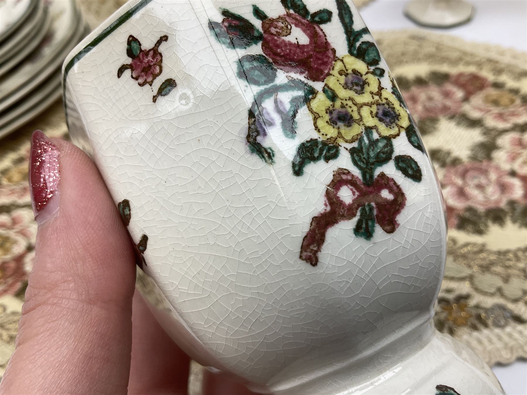 Royal Doulton part dinner service in Old Leeds Sprays pattern,  to include cheese dome, teapot and stand, egg cups etc, together with a selection of floral doilies.  