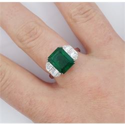 18ct white gold octagonal cut emerald, round brilliant cut and baguette cut diamond ring, stamped 750, with World Gemological Institute report