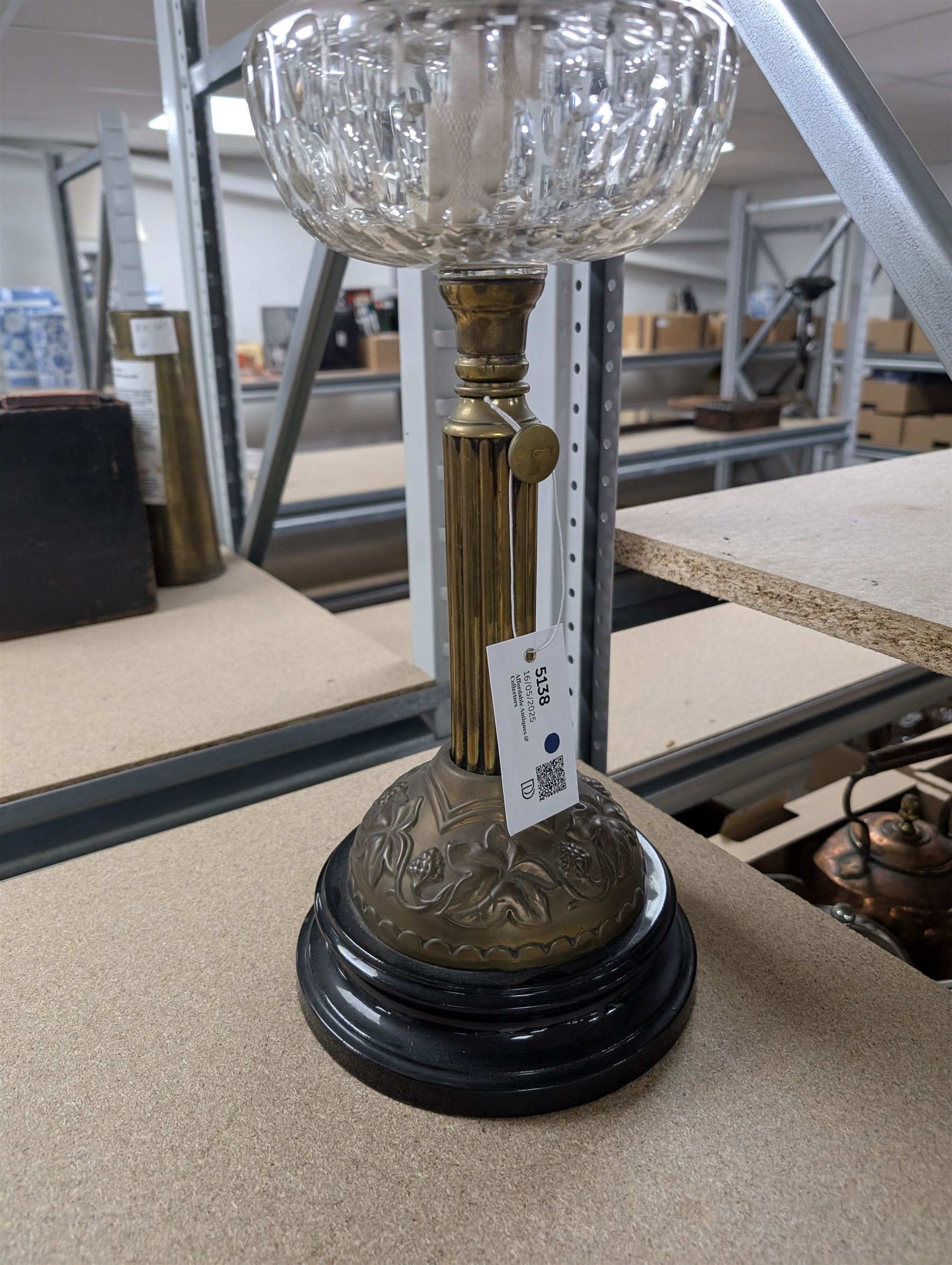 Oil lamp with frilled green glass shade, glass reservoir, upon upon corinthian column with stepped circular base, H74cm