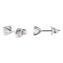 Pair of 18ct white gold diamond stud earrings, stamped 750, total diamond weight approx 0.80 carat