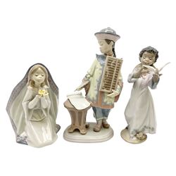 Three Lladro Figures, comprising African Love no 6154, Asian Scholar no 6177 and Reverent Moment no 5792, all with original boxes, largest example H24cm