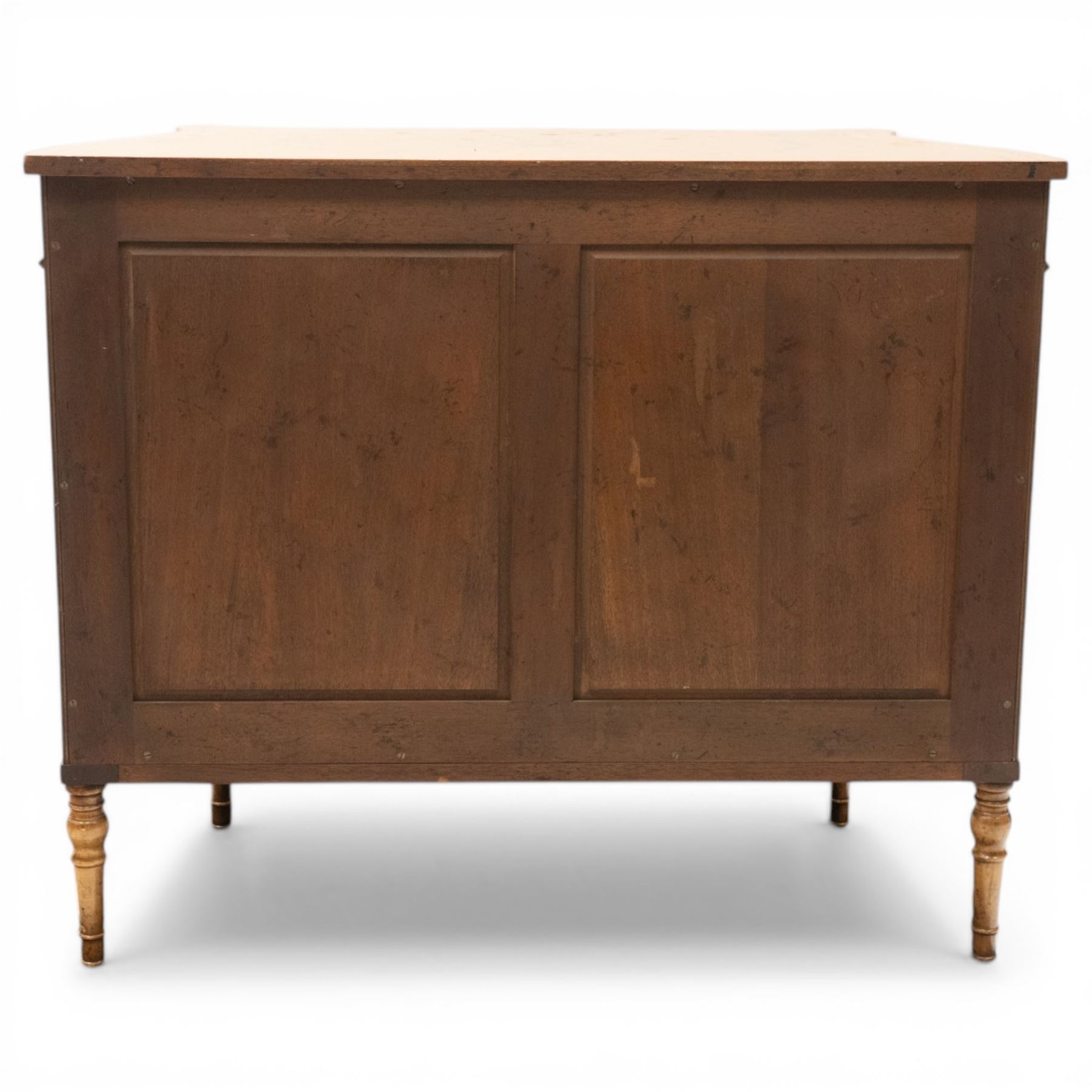 Sheraton Revival satinwood serpentine-front cabinet, the shaped cross-banded top with ebony stringing and painted scrolls of acanthi and ribbon work with a bell-flower border, the banded frieze painted with repeating acanthus scrolls, the matched veneer doors painted with oval panels of floral bouquets, raised on turned and tapering supports