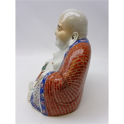  20th century porcelain figure of Hotei, seated wearing flowing robes, holding beads in his right hand with pierced decoration, impressed seal mark to base, H26cm x W24cm   