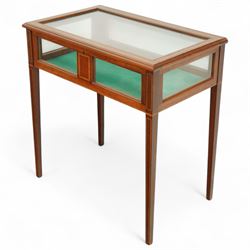 Edwardian satinwood and inlaid bijouterie table, rectangular hinged glazed top above a baize-lined interior, frieze with panelled inlay detail, raised on square tapered legs with boxwood and ebony stringing