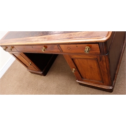  Victorian mahogany twin pedestal partners desk, leather inset top with moulded edge, two long and ten short graduating drawers, two cupboard doors, plinth base, W152cm, H75cm, D105cm  