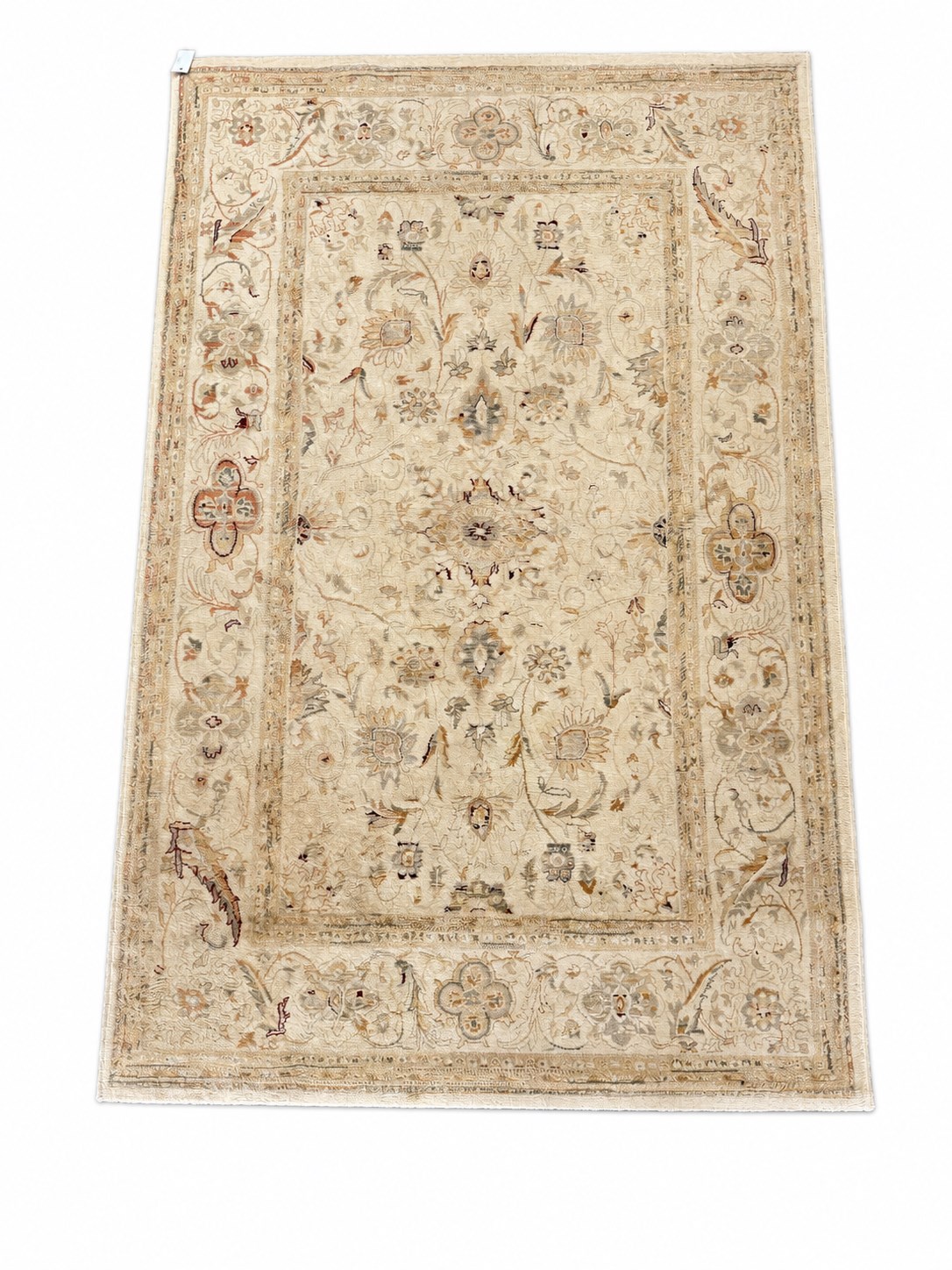 Persian design beige ground rug, patterned field