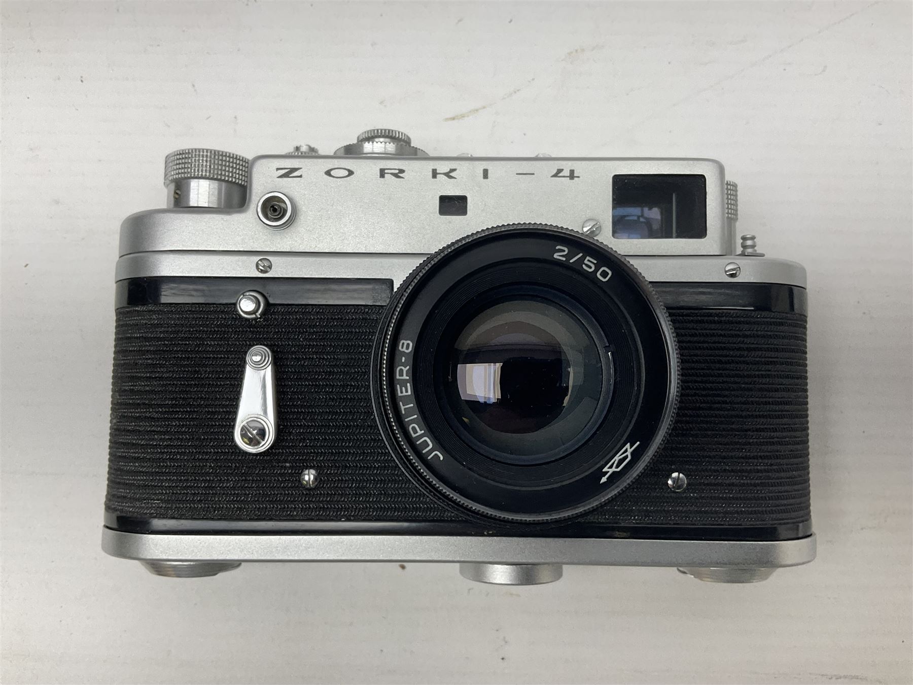 Zorki-4K camera body, serial no 74334713 with 'Jupiter-8 2/50' lens serial no 7454365, Zorki-4 camera body serial no 71012418 with 'Jupiter-8 2/50' lens serial no 0174594, and three other cameras 