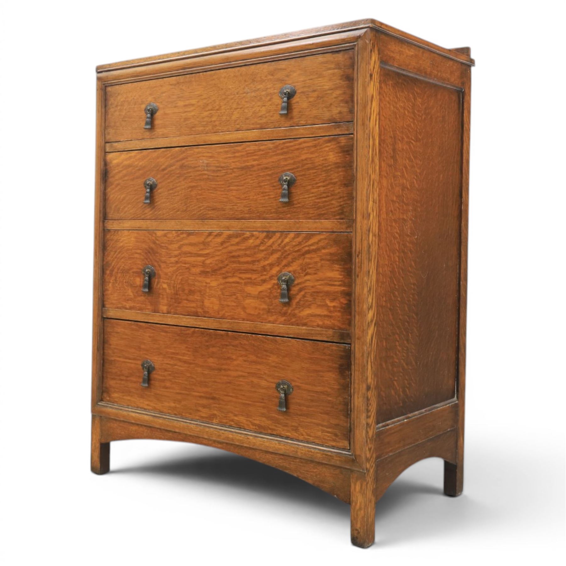 20th century oak chest, shaped gallery top over four graduating drawers, with metal drop handles, raised on stile feet 