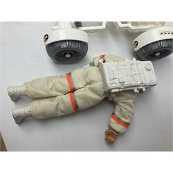 Action Man - large collection of 1960s and later figures and accessories including Spaceman with ATLRV vehicle; two figures marked 'Made in England by Palitoy under licence from Hasbro 1964'; twenty-five assorted weapons; radio backpacks; kit bags; twenty-one pairs of boots; football boots and snow shoes; metal diver's boots and three pairs of flippers; two pairs of jackboots; roller skates; various tunics, trousers, flying suits, jumpers, belts etc; twenty helmets, berets, busby, kepis, submariner etc; and quantity of other accessories