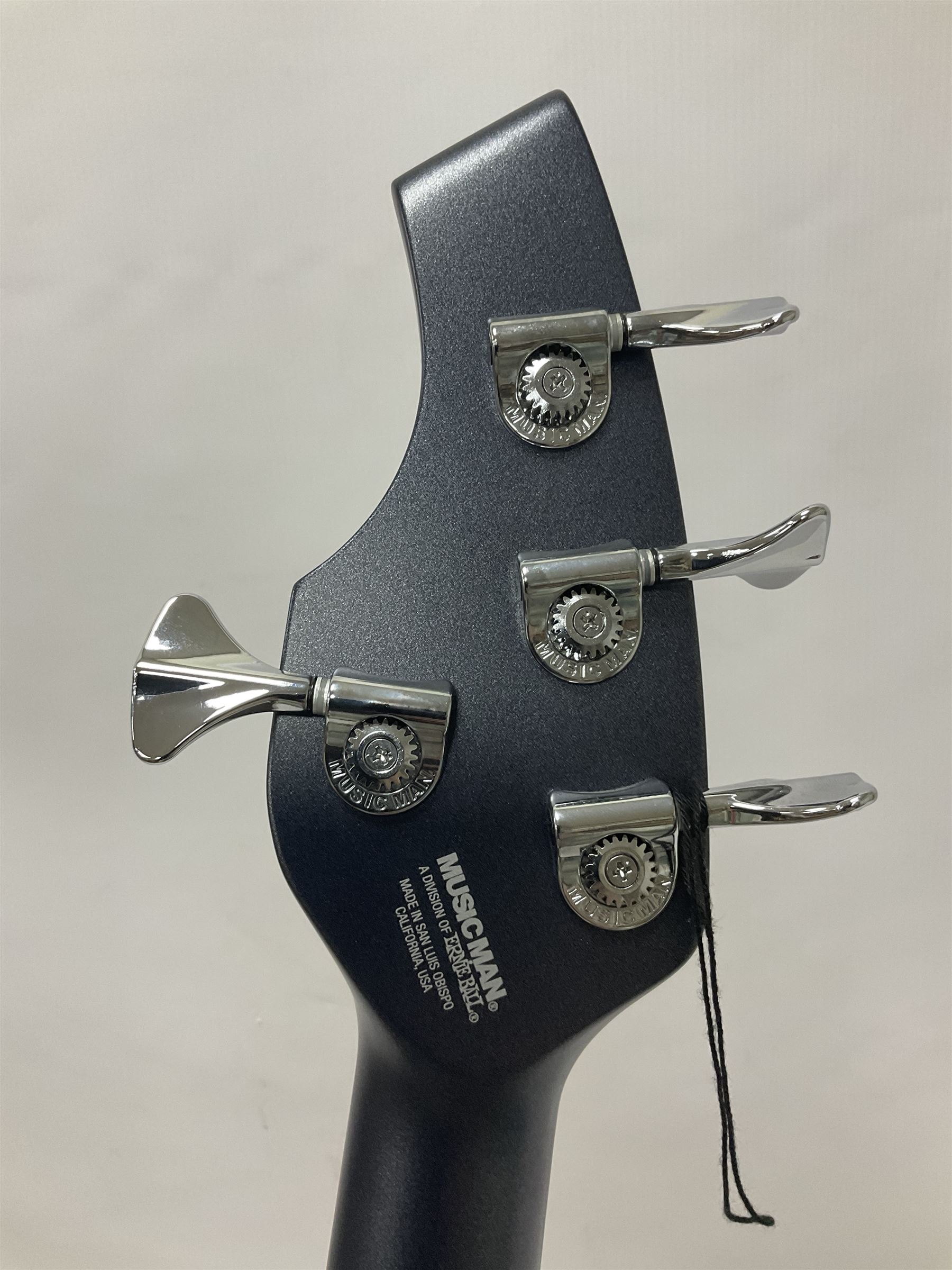 Music Man Bongo 4 string bass guitar, in sapphire black finish, serial no F42547, in black Music Man hard case, guitar L113cm