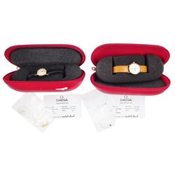 Two Omega ladies 9ct gold manual wind wristwatches, on leather straps, both with repair warranty cards dated 2012 and 2013, both cased