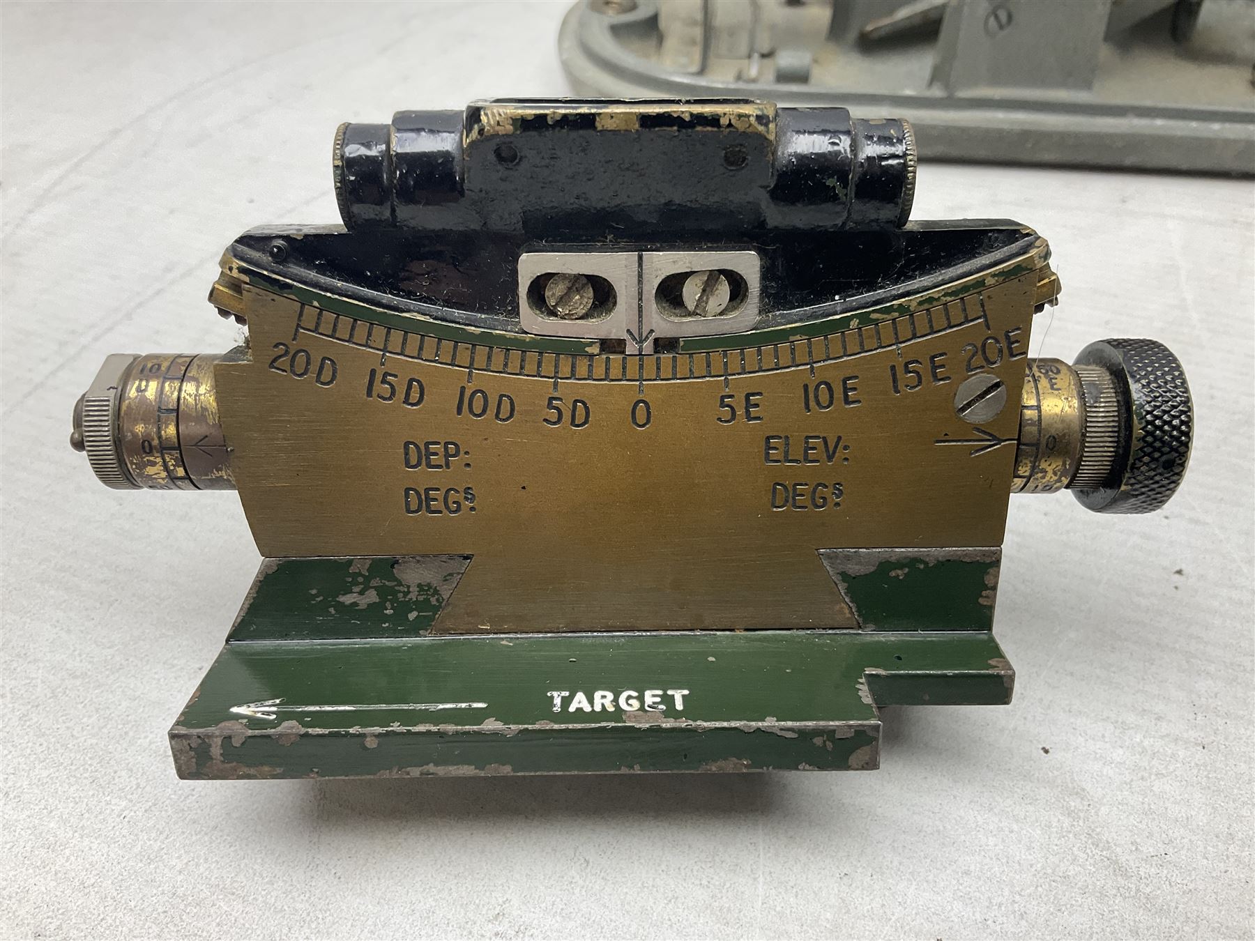 Cooke Troughton & Simms grey painted brass dumpy level in carrying case; and WW2 British .303 Vickers Machine Gun brass Clinometer, stamped 'V.E. 0067' serial No. 2370,  dated 1944 unboxed (2)