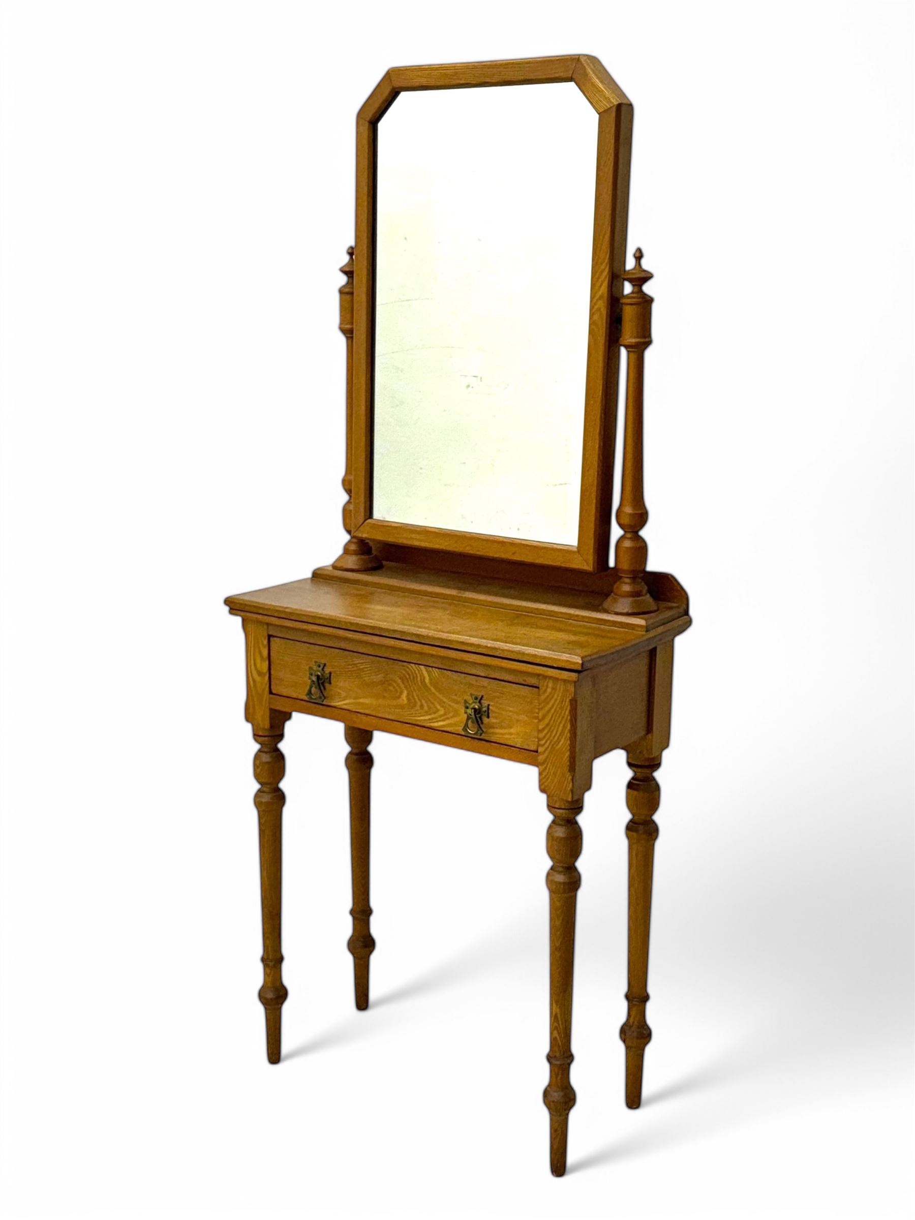 Late 19th century ash dressing table, rectangular mirror supported by two turned columns with carved finials, single drawer with brass handles, raised on turned supports