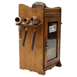 Small Edwardian oak smoker's cabinet with tobacco jar, Meerschaum pipe, three clay pipes, cigar cutter etc
