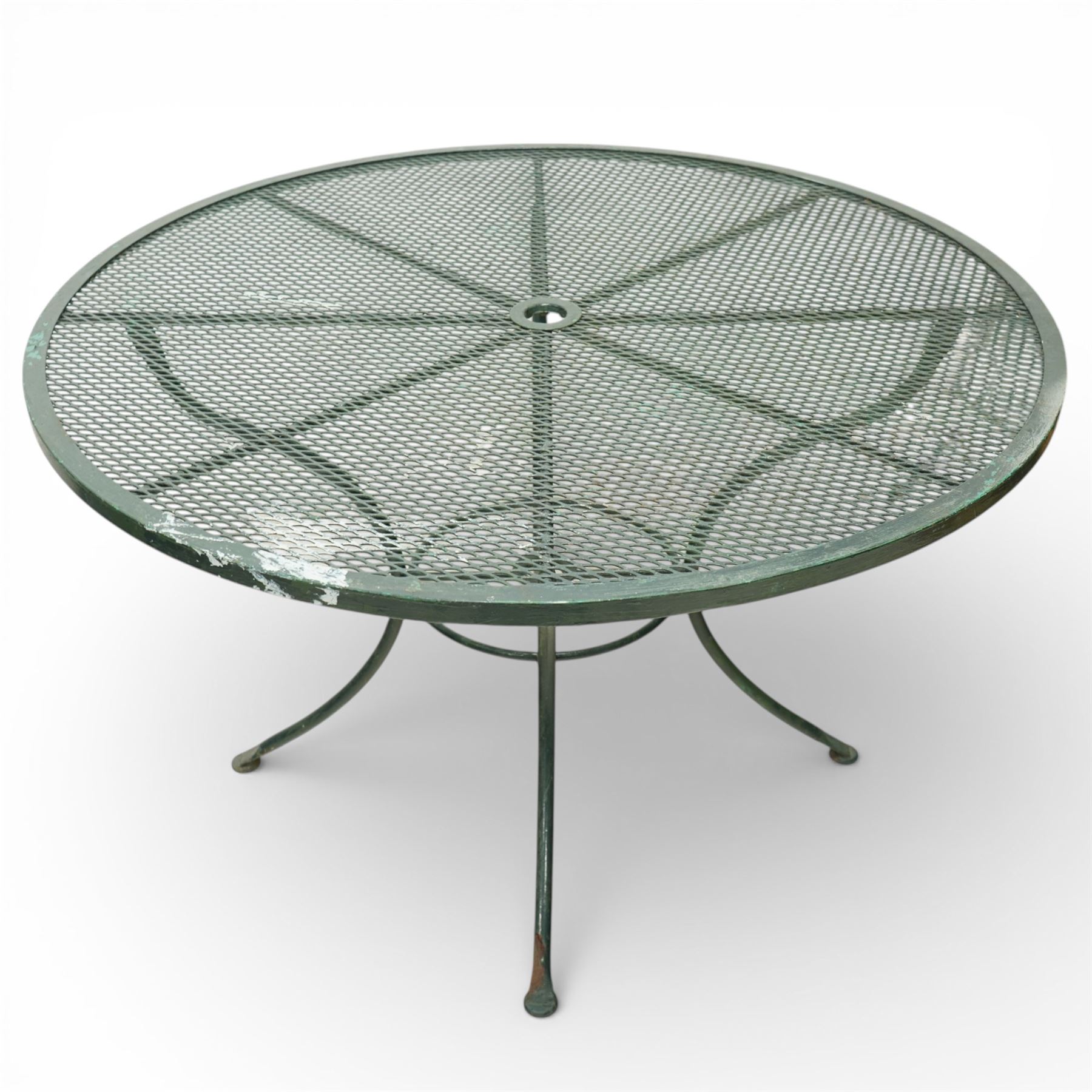 Green painted wrought metal garden table and chairs, with green striped cushions 