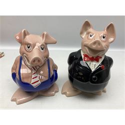 Set of five Wade NatWest money boxes, comprising father, mother, boy, girl and baby, four with original boxes 