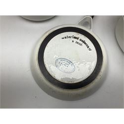 Le Creuset cast iron casserole dish, together with two Waterford cast iron dishes and a frying pan