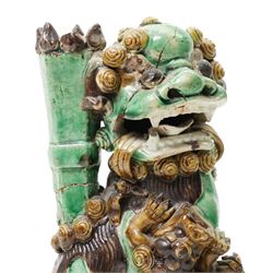 Chinese Kangxi period sancai glazed joss-stick holder, modelled as a dog of Foo, H21cm; and another figure, H18cm (2)