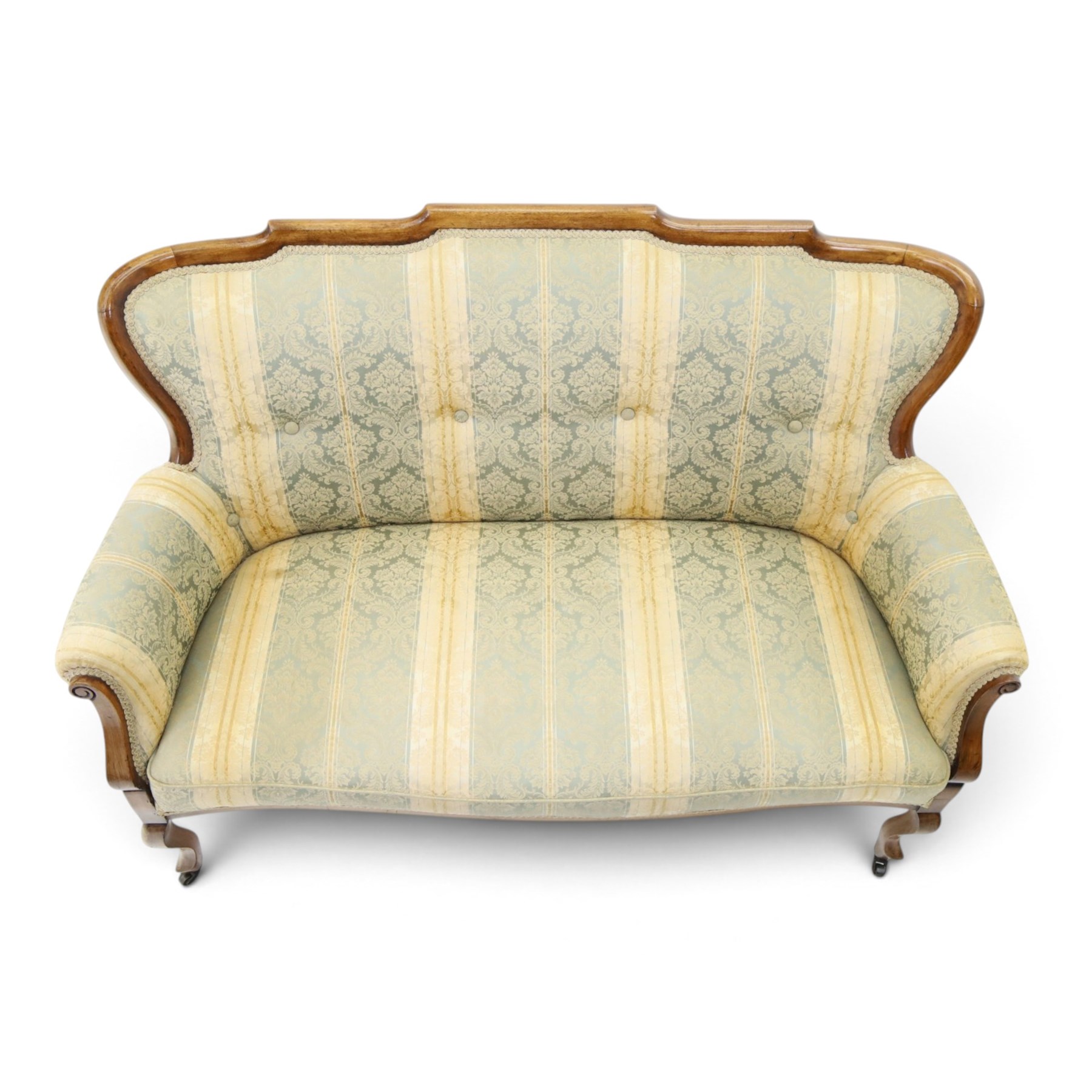 Edwardian mahogany three-piece salon suite, comprising settee and two armchairs, shaped frames with upholstered backs, scrolled arm supports and serpentine seat rails, upholstered in striped floral damask fabric, on cabriole supports with castors (Armchairs: H 96cm, W 70cm, D 68cm)