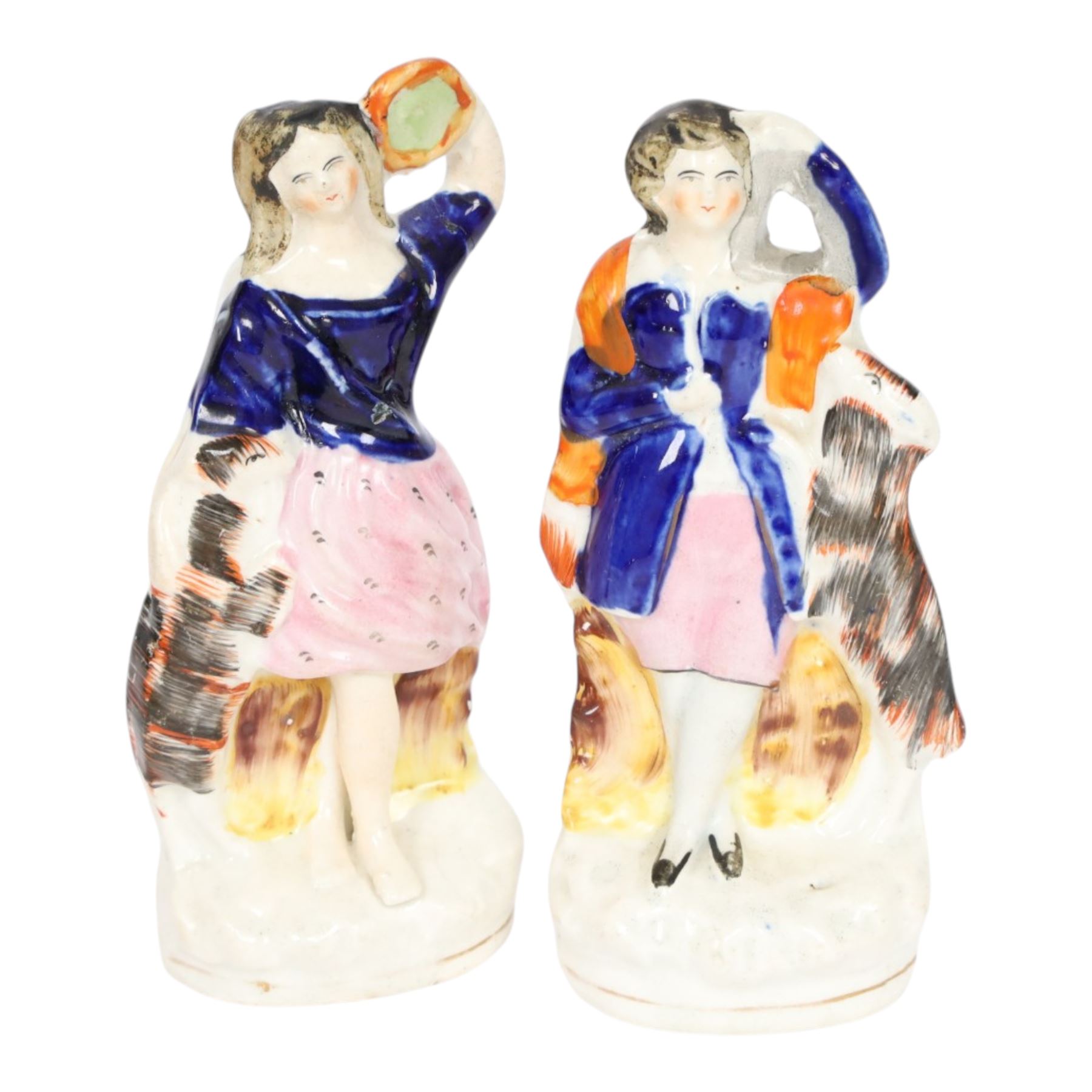 Six 19th century Staffordshire Theatre figures, comprising rare example of Jules Perrot as Diavolino, Jules Perrot as Albrecht, Carlotta Grisi as Esmeralda, Carlotta Grisi as Esmeralda and Jules Perrot as Gringoire, and further pair, tallest example H24.5cm


