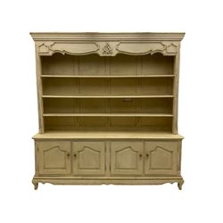 Large French style cream painted dresser, fitted with four cupboards and three tier plate rack