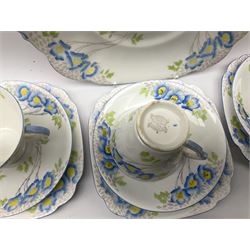20th century Lawleys of Regent Street Himalayan flower pattern tea set for four place settings, comprising cups and saucers, dessert plates, cake plate, milk jug and open sucrier (15)