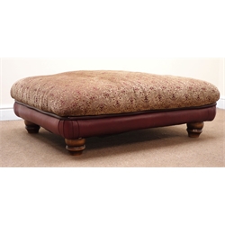  Large rectangular footstool upholstered in a maroon leather and light gold fabric, turned supports, W114cm, H36cm, D87cm  