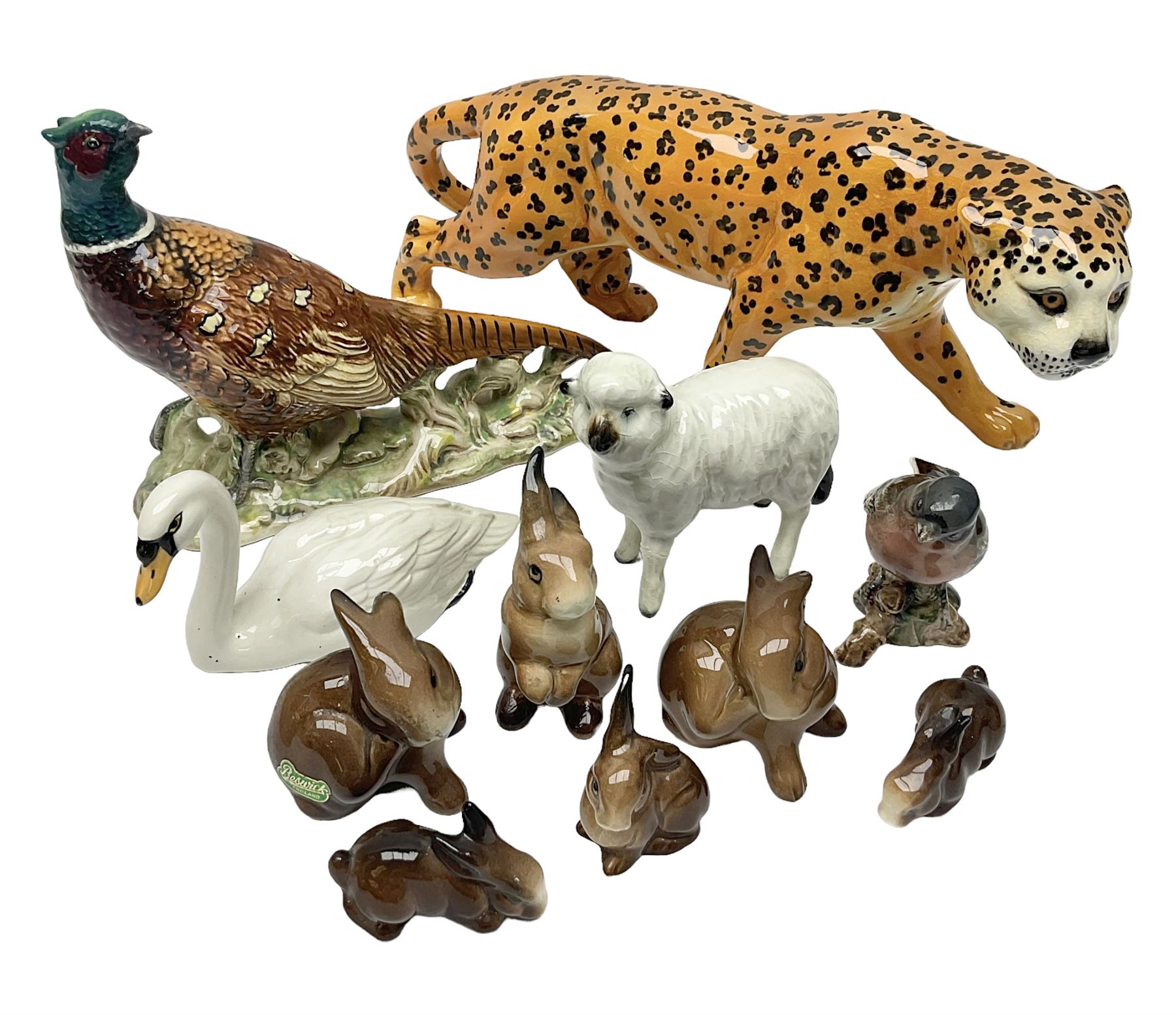 Group of Beswick figures to include leopard no 1082, rabbits, swan, pheasant no 1226 etc, all with marks beneath