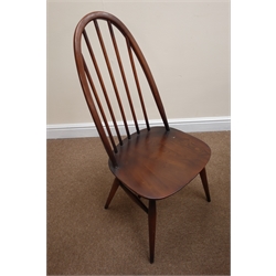  Set six (5+1) elm Ercol high hoop back dining chairs (W42cm) and an elm drop leaf oval table, square supports joined by an 'X' stretcher (W114cm, H72cm, D125cm)  