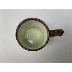 Five 19th century blue and white Delft tiles, each decorated with a central circular panel, containing buildings, boat, and swan, and a Victorian lustre mug decorated with polychrome flowers, tiles H13cm W13cm. 