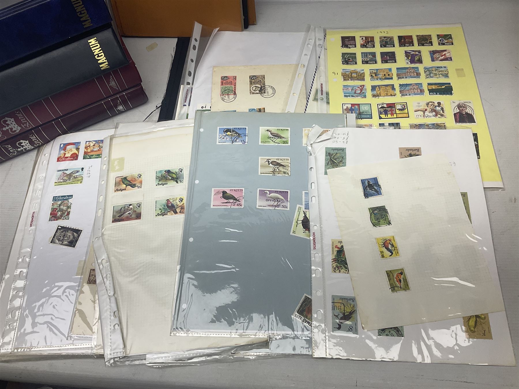 World stamps including Australia, Antigua, Canada, New Zealand, St Vincent, Republic of Maldives, Norfolk Island, Malta etc, Great British and other first day covers, Queen Elizabeth II 60th Birthday commemorative stamps etc, housed in five albums/folders and loose, in one box