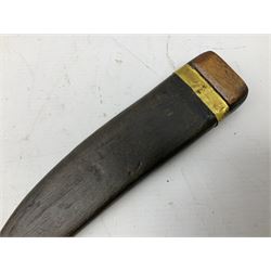 19th century Singhalese knife pia kaetta, the 20cm steel blade inset with yellow and white metal, with metal mounted carved pistol grip, in plain wooden scabbard L33cm overall