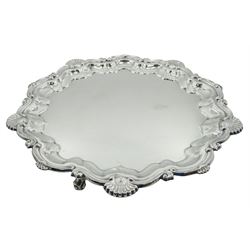 Mid 20th century silver salver, with cast shell and scroll rim, upon three scroll feet, hallmarked Frank Hawker Ltd, Birmingham 1966, D31.5cm, approximate weight 25.97 ozt (808 grams)